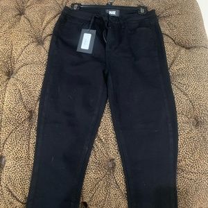 Black skinny jeans, never worn with tags